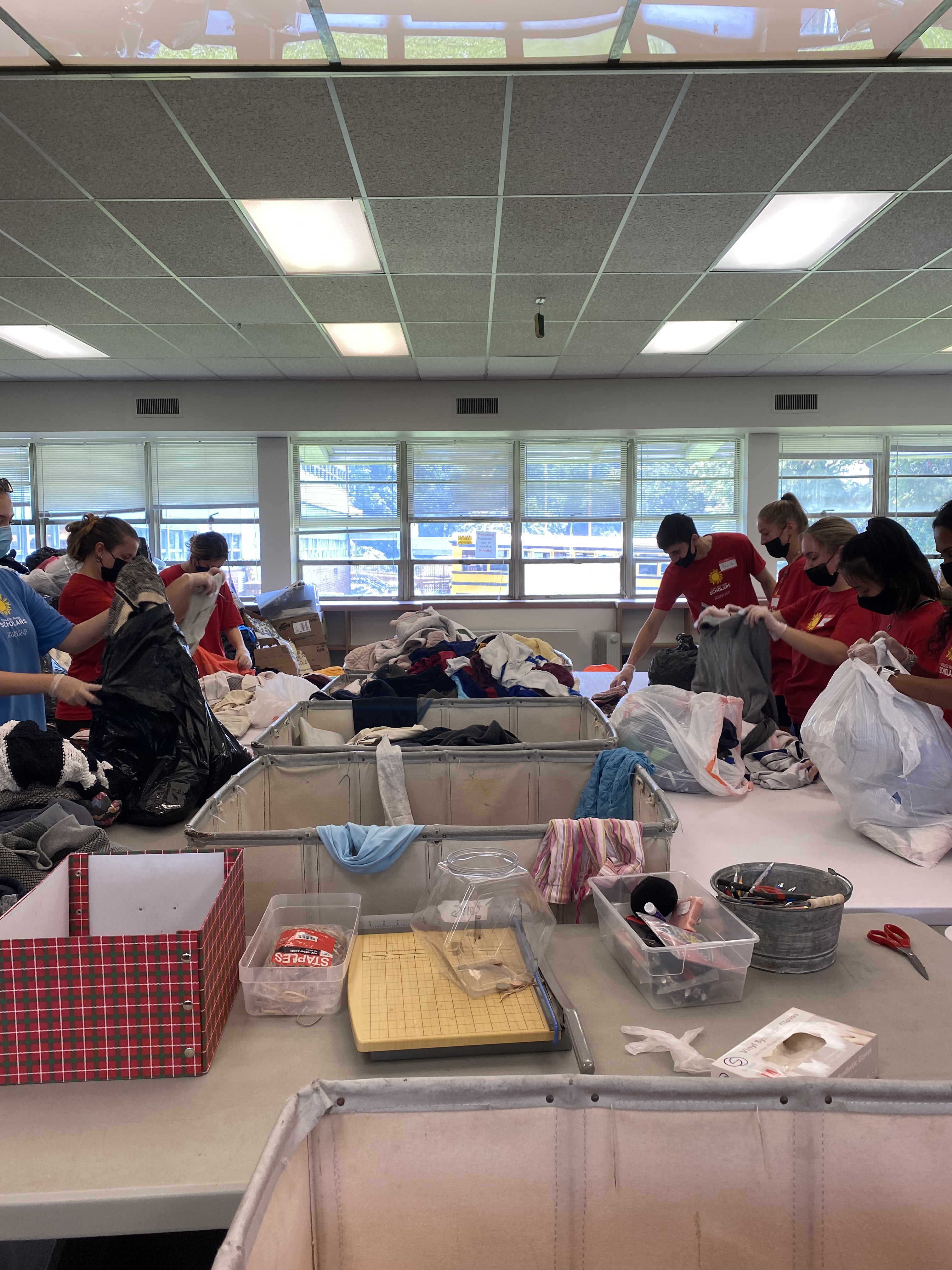 students sorting clothes