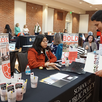 students and advisors at conference event