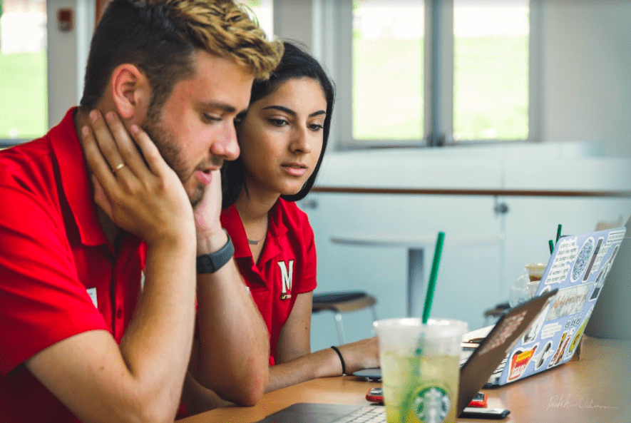 Orientation Advisors working on laptops