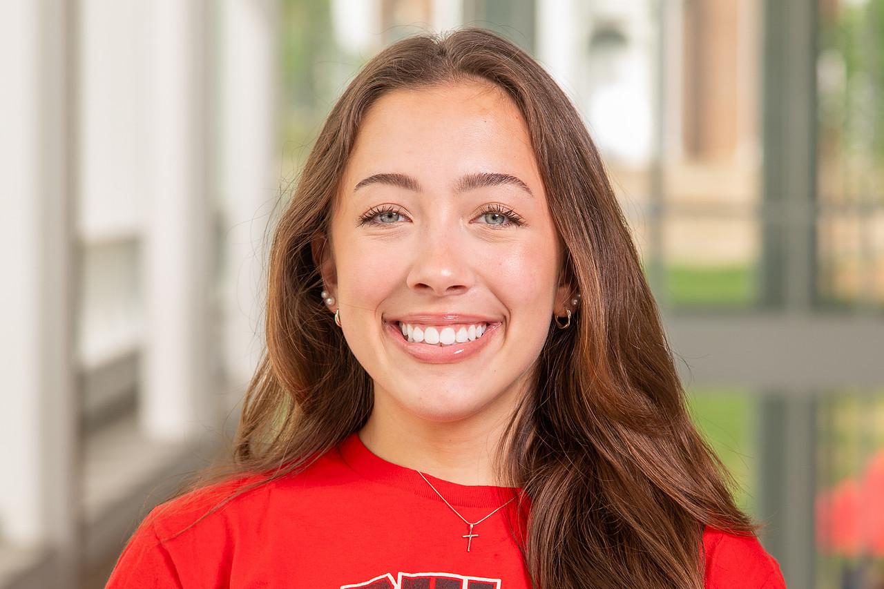 Transition Mentor Liana Flowers in a red UMD t-shirt