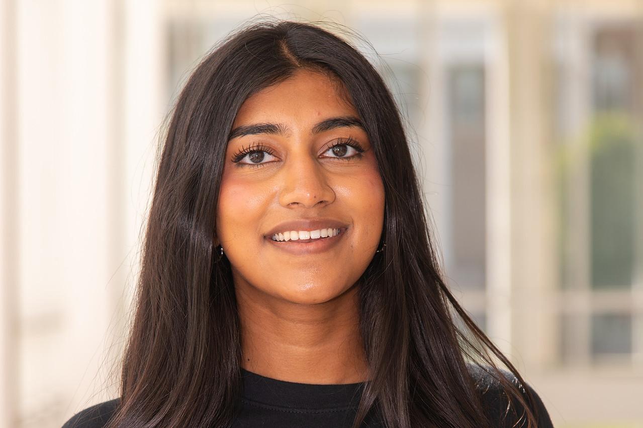 Transition Mentor Varshikka Karishnaraj in a black UMD long sleeve